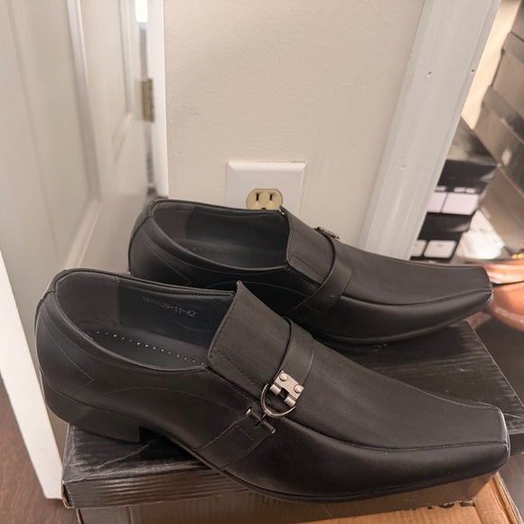 Sleek Black Loafers with Buckle Detail